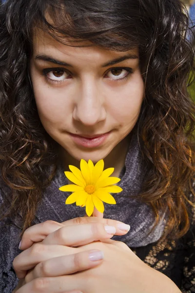 Stock image Beautiful girl with yellow flower