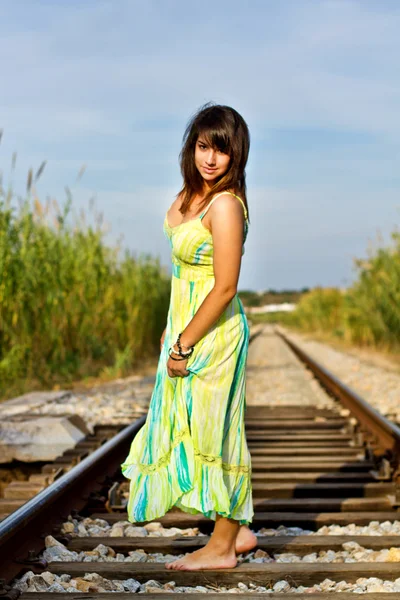 Beautiful girl on a railway — Stock Photo, Image