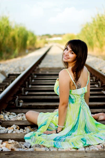 Beautiful girl on a railway — Stock Photo, Image