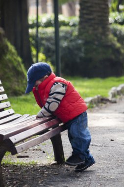 Young child with cap