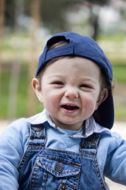 Young child with cap