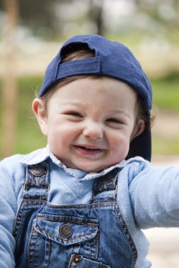 Young child with cap