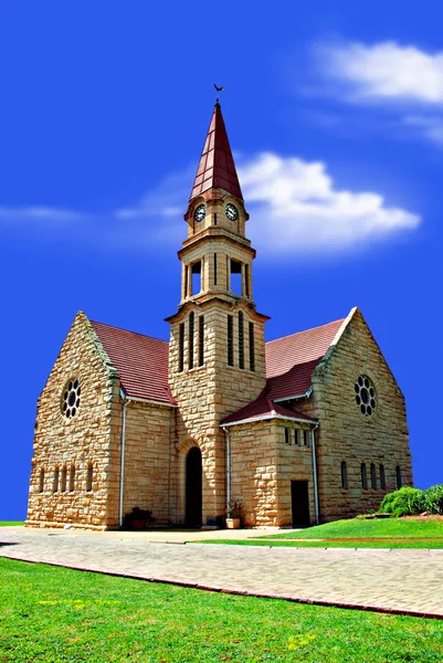 stock image Old church on a hill with and clouds