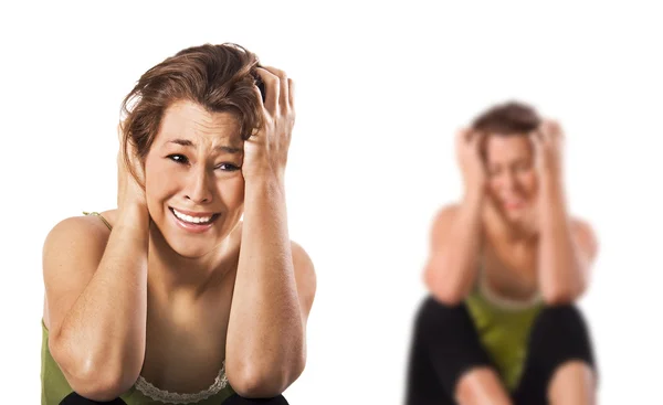Zoufalé depresi mladá žena na bílém pozadí — Stock fotografie