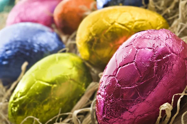 stock image Colorful easter eggs in straw