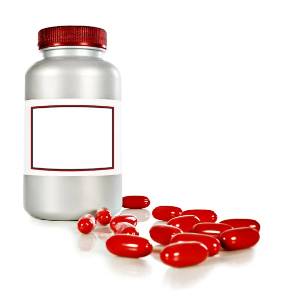 Una botella de píldoras rojas de alegría sobre un fondo blanco con espacio para el texto —  Fotos de Stock