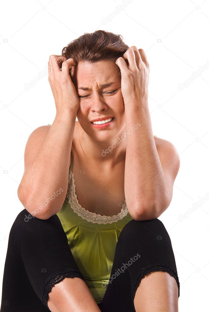 A Very unhappy young woman on a white background
