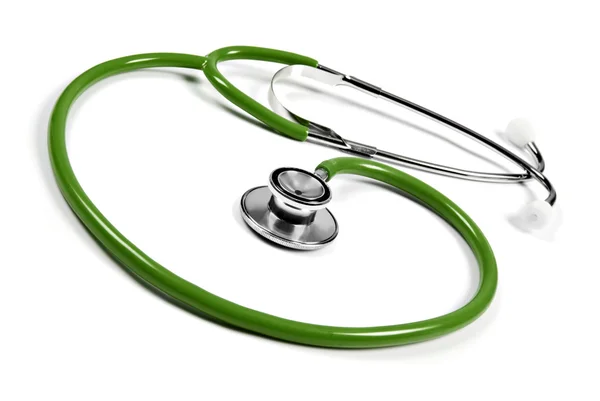 Grünes Stethoskop auf weißem Hintergrund — Stockfoto
