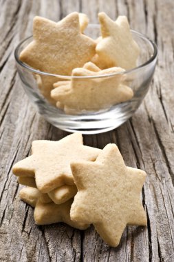 Sugar coated shortbread cookies in star shapes clipart