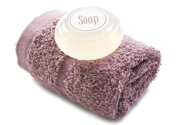 Pink towel with soap — Stock Photo, Image