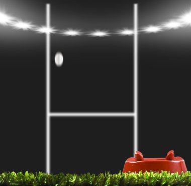 Rygby ball kicked to the posts clipart