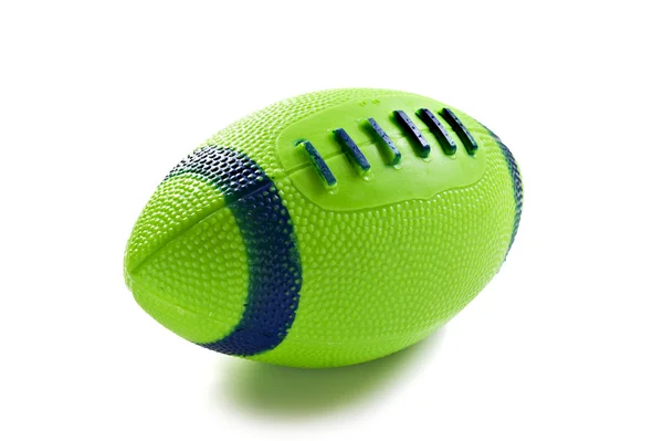 Groene speelgoed rugbybal geïsoleerd op wit — Stockfoto
