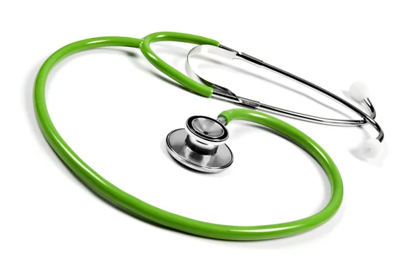 A Green doctor's stethoscope on a white background with space for text — Stock Photo, Image