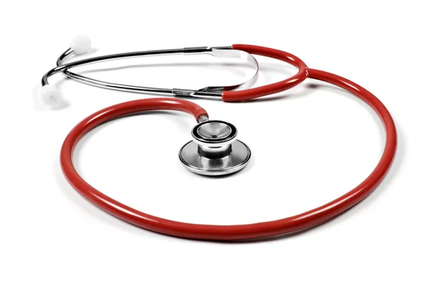 En röd läkare stetoskop på en vit bakgrund med utrymme för text — Stockfoto