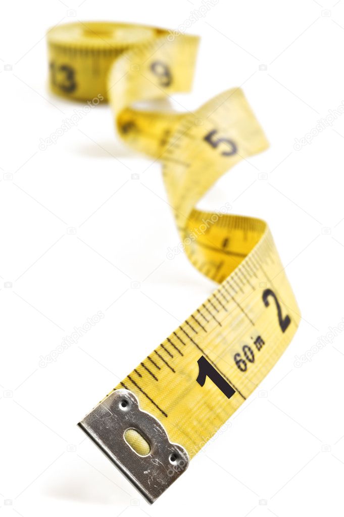 Yellow tape meassure on rolled up on white background