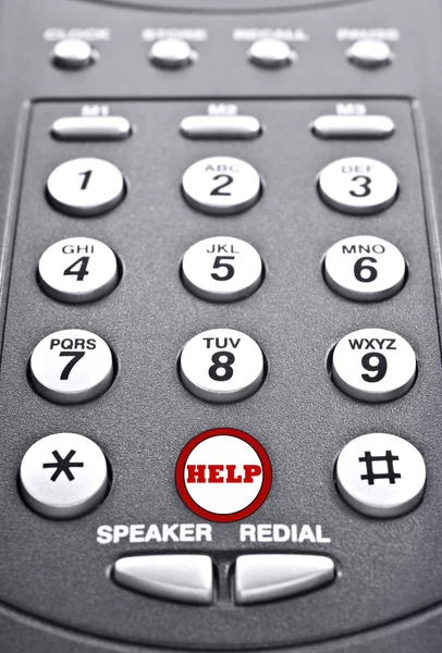 Keypad of a telephone with a red button for help — Stock Photo, Image