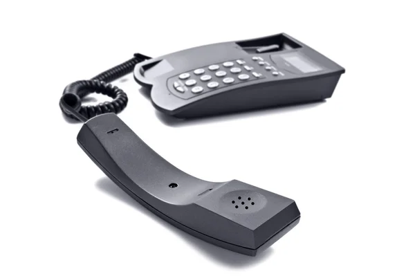 Teléfono negro aislado en blanco con espacio para texto — Foto de Stock