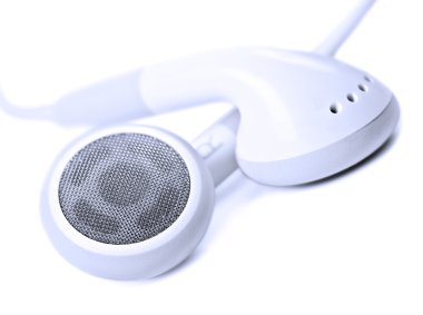 Macro close up of white earphones - very shallow depth field clipart