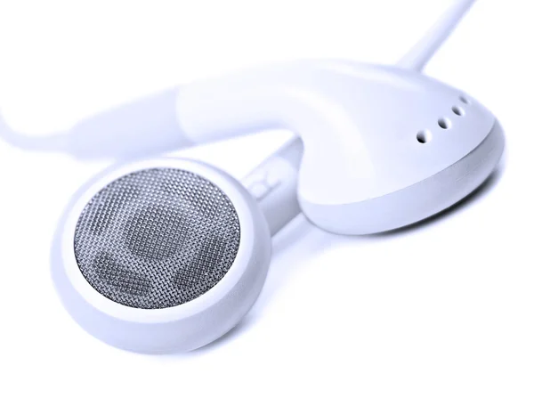 Μακροεντολή κοντινό πλάνο της λευκά ακουστικά - πολύ ρηχό βάθος πεδίου — Φωτογραφία Αρχείου