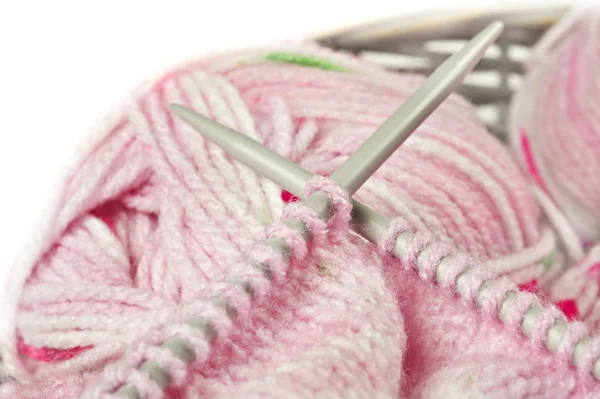 Knitting a pink baby jersey — Stock Photo, Image