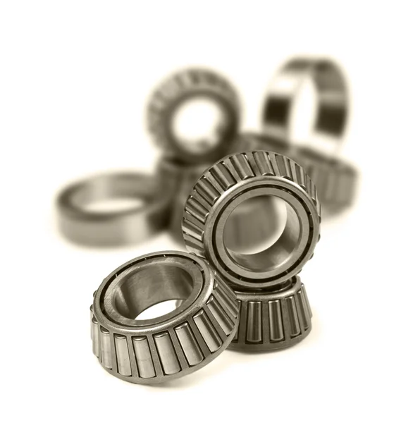 Ball bearings on a pure white background with space for text — Stock Photo, Image