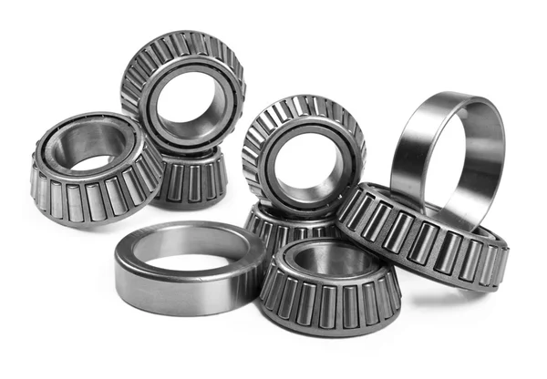 Ball bearings on a pure white background with space for text — Stock Photo, Image
