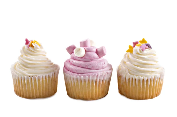 Pink and cream cupcakes against a white background — Stock Photo, Image