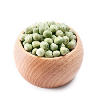 Wooden bowl full of green peas isolated on white