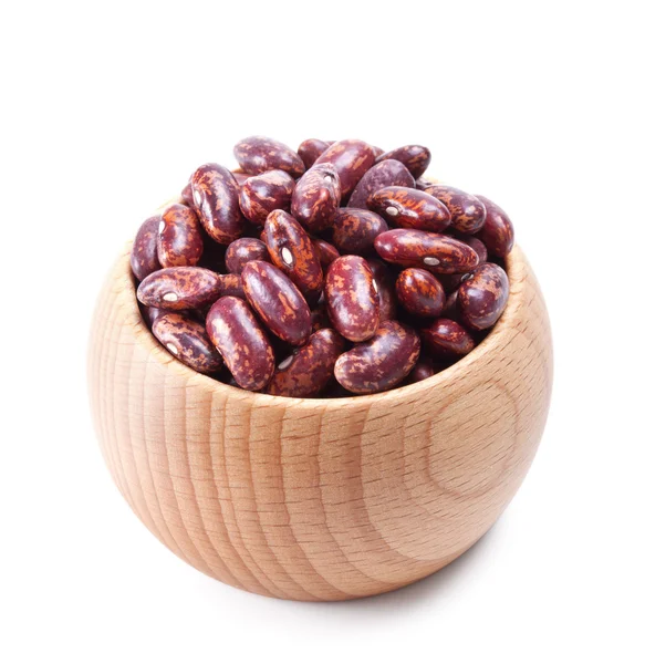 Wooden bowl full of red speckled kidney beans isolated on white — Stock Photo, Image