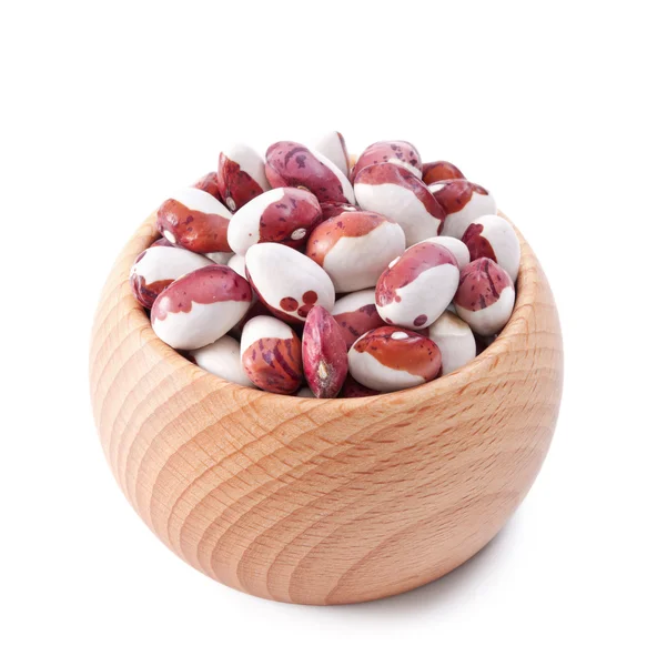 Wooden bowl full of beans isolated on white — Stock Photo, Image