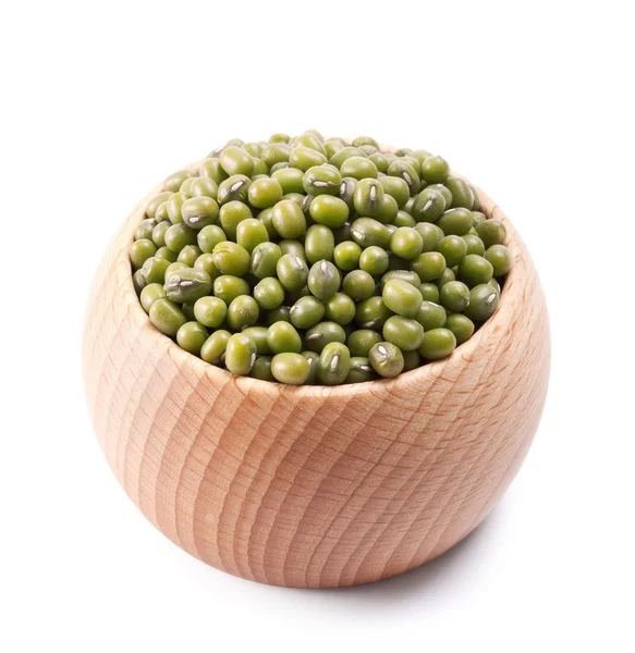 Wooden bowl full of green mung beans isolated on white — Stok Foto