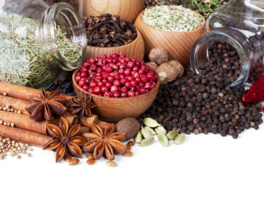 Background of different spices on white clipart