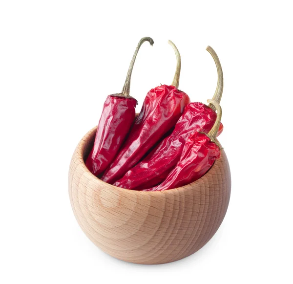 Wooden bowl full of red chili pepper isolated on white — Stock Photo, Image