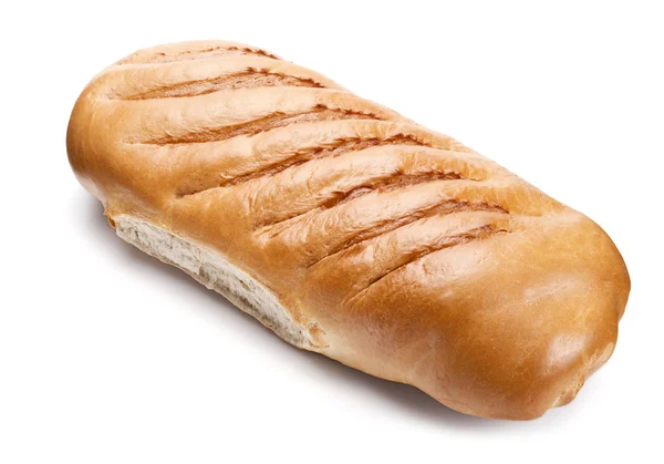 Big wheat loaf isolated on white — Stock Photo, Image