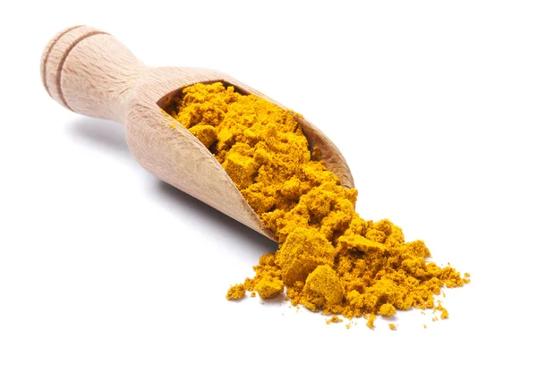 Wooden shovel with turmeric — Stock Photo, Image