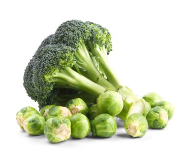 Fresh broccoli and brussels sprouts isolated on a white clipart