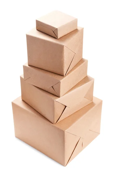 Stack of parcel wrapped with brown packing paper — Stock Photo, Image