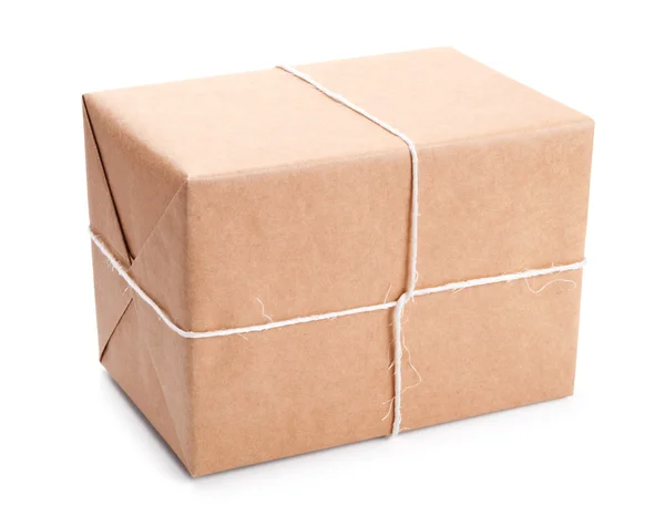 Parcel wrapped with brown packing paper — Stock Photo, Image
