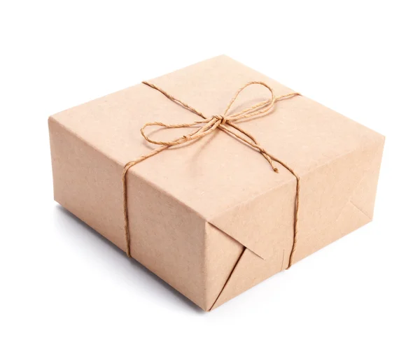 Parcel wrapped with brown packing paper — Stock Photo, Image