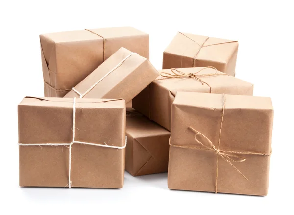 Group of parcel wrapped with brown packing paper — Stock Photo, Image