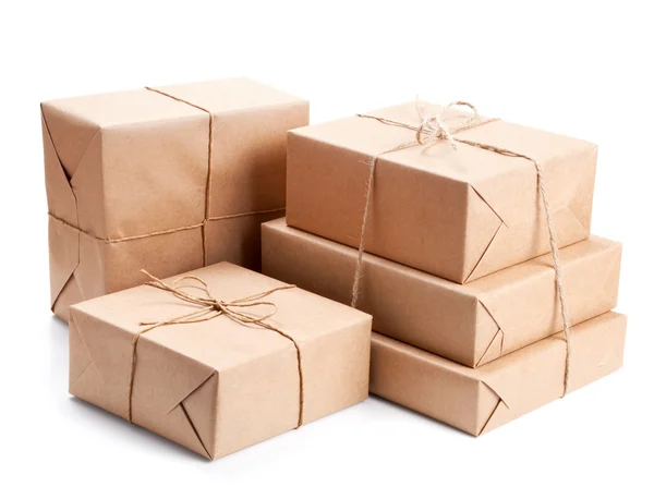 Group of parcel wrapped with brown packing paper — Stock Photo, Image