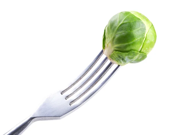 Fork with fresh green Brussels sprouts — Stock Photo, Image