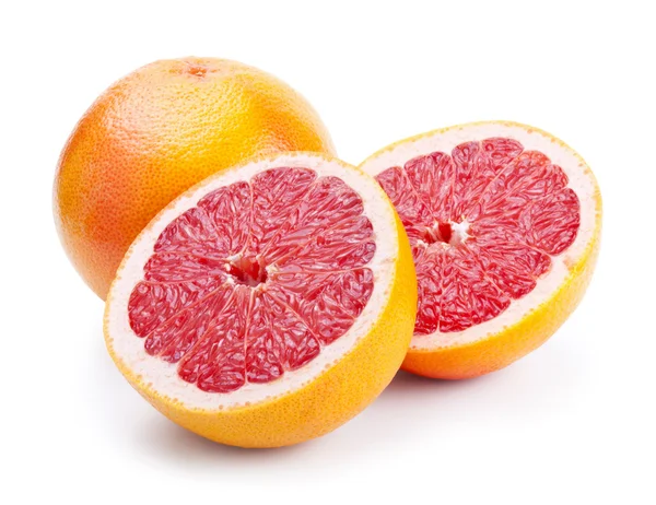 Grapefruit met plakjes geïsoleerd op wit — Stockfoto