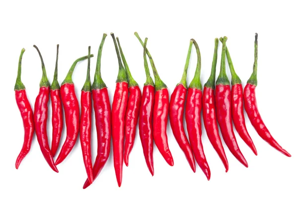 Red chili peppers isolated on white — Stock Photo, Image