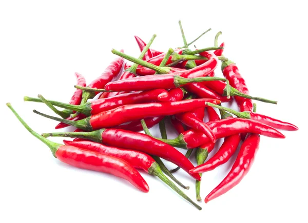 Červené chilli papričky izolované na bílém — Stock fotografie