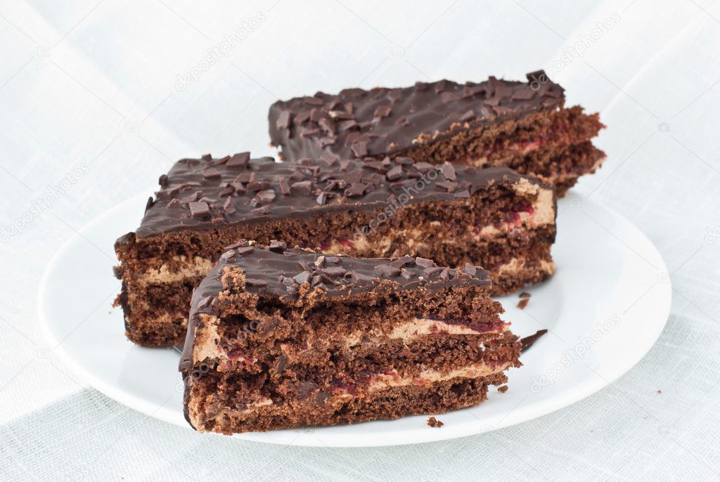Three pieces of chocolate cake