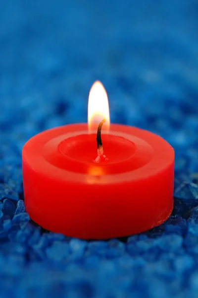 Candle on the spa salt — Stock Photo, Image