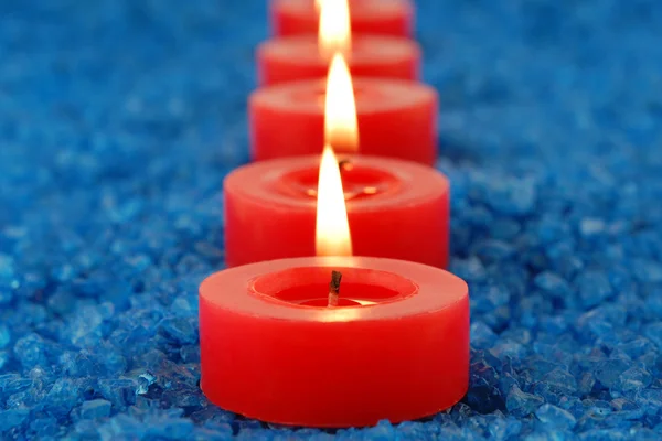 Candles on the spa salt — Stock Photo, Image