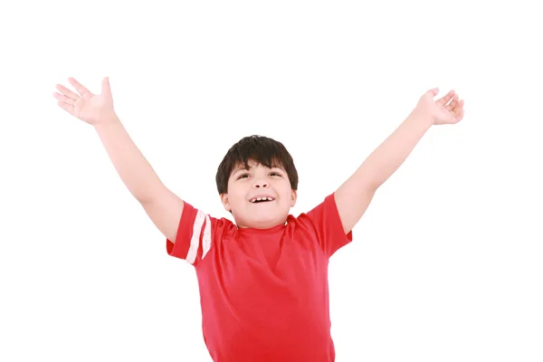 Young casual little boy with open arms and looking up, isolated — Stock Photo, Image