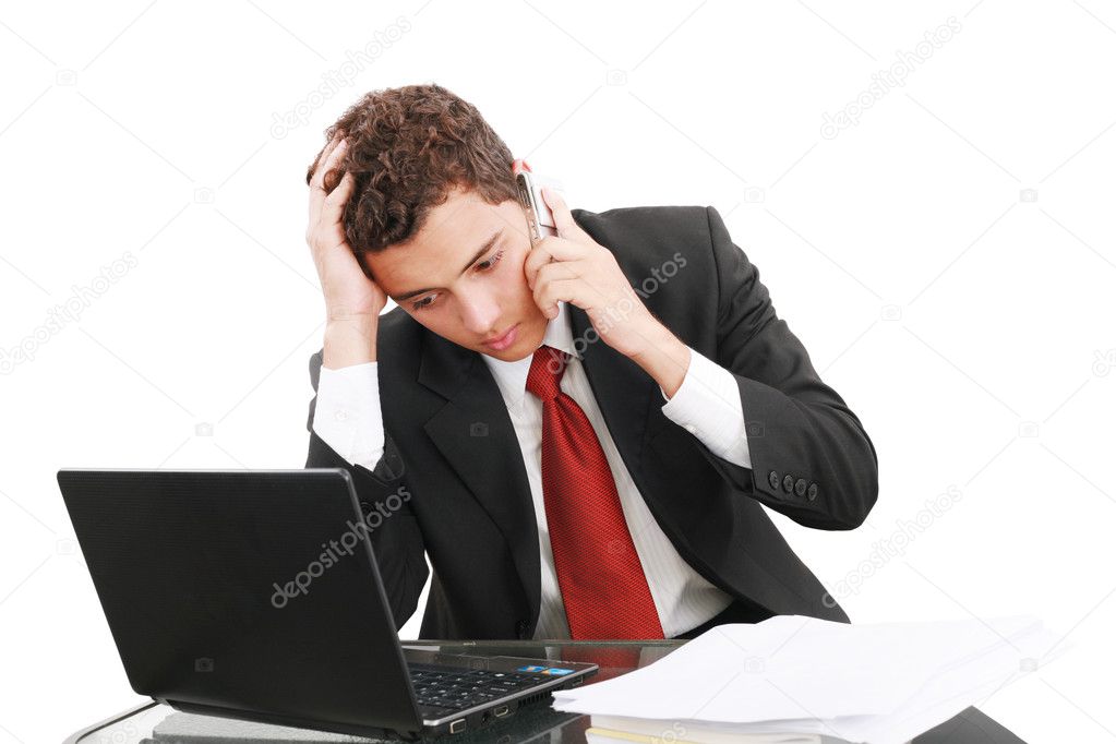 Worried businessman on the phone, unhappy businessman